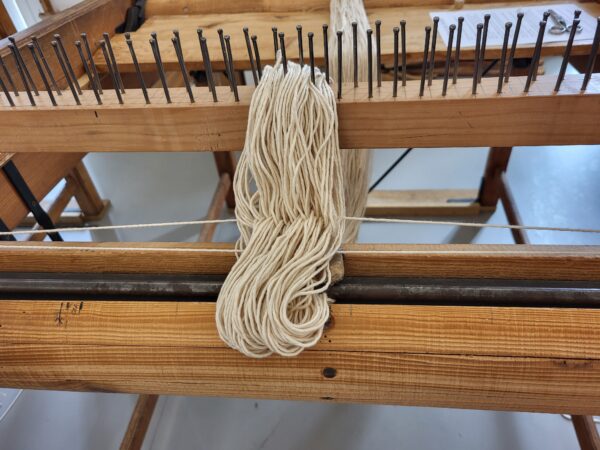 Stage de montage de la chaîne sur métier de basse-lisse et confection des lisses