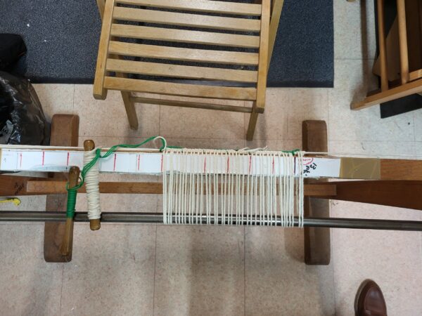 Stage de montage de la chaîne sur métier de basse-lisse et confection des lisses